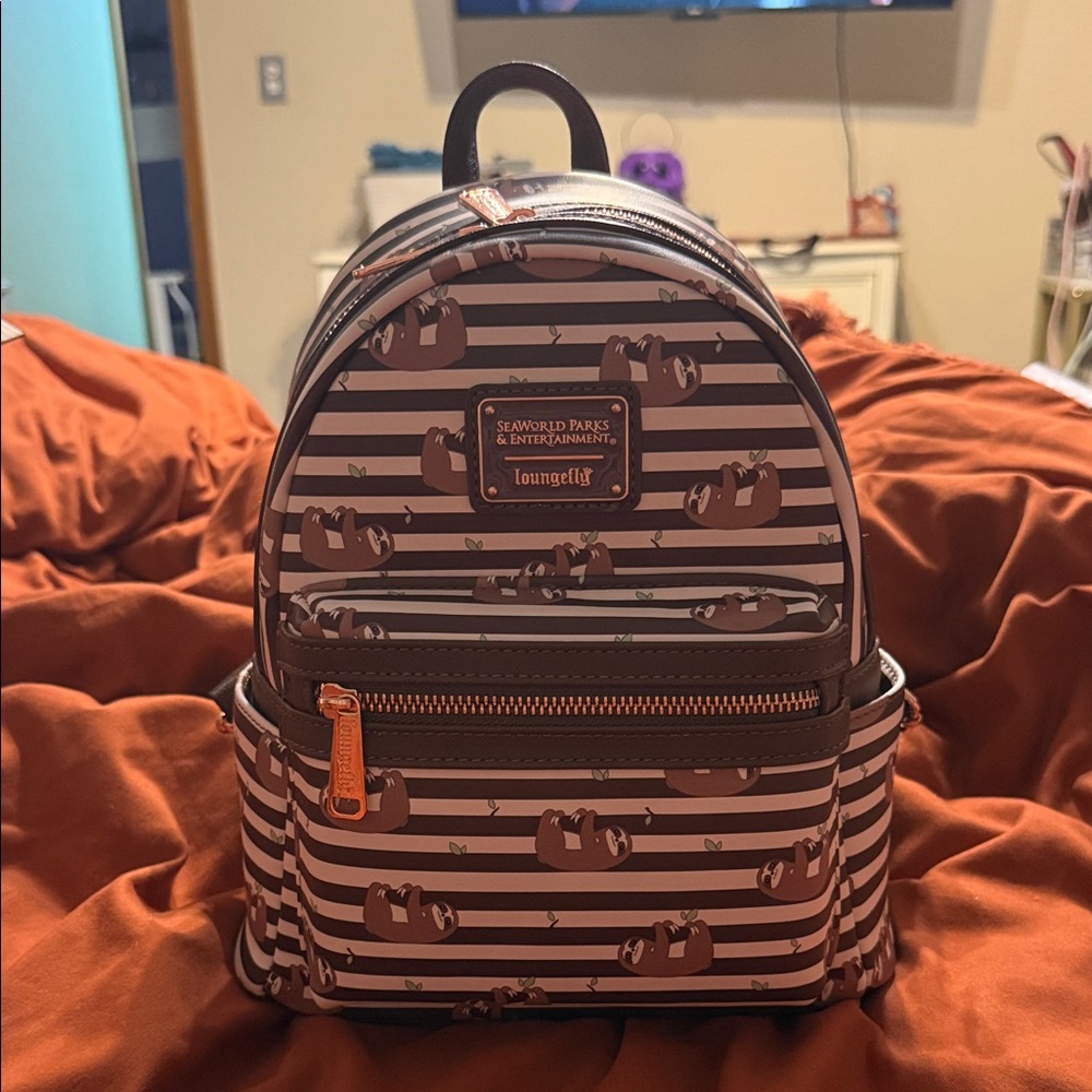 Loungefly Brown and Tan Sloth Backpack seaworld parks and entertainment